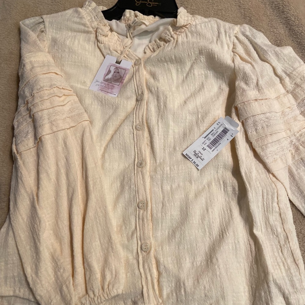 Jessica Simpson blouse. Size 12. Brand new with tags.